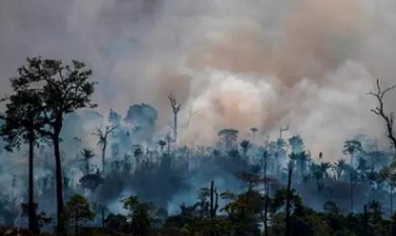 Smokes rises from forest fires in Altamira in August. Farm owners have scuffled with forest defenders in the Amazonian city. Photograph: Joao Laet/AFP/Getty Images