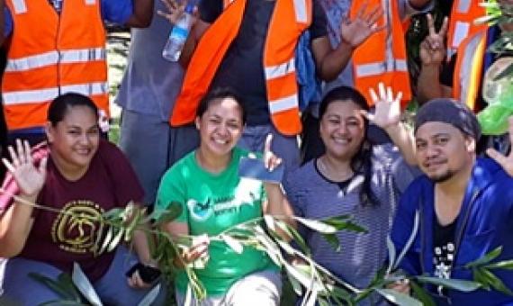 The team involved in the Rattan Raid holding the Rattan palms that were found at Papaseea. Credit - Samoa Conservation Society