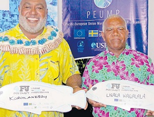 Minister for Fisheries Semi Koroilavesau and 4FJ Movement Champion Lisala Waqalala with their pledge boards at the launch. Credit - https://www.fijitimes.com/