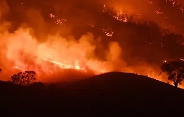 A bushfire rages in Mount Adrah, Australia. Global heating has led to an increase in the frequency and severity of fire weather. Photograph: Getty