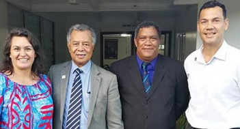 Marine scientist Jacqueline Evans, Prime Minister Henry Puna, House of Ariki president Travel Tou Ariki and rugby star Kevin Iro just after the Cook Islands government passed the Marae Moana Act establishing the country’s entire exclusive economic zone as a mixed-use marine protected area in 2017. Credit - Marae Moana Coordination Office.