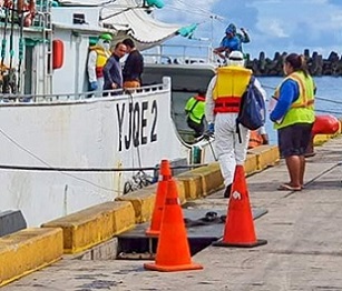 COVID-19 protocols being practiced at Apia Port, Samoa. Source - http://www.tunapacific.org/