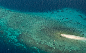 coral reef and sand bar, Pacific ocean. Credit - UN Photo/Eskinder Debebe
