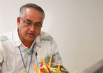 FFC Chair Mr Eugene Pangelinan, left, and FFA Director-General Dr Manu Tupou-Roosen, right, at Sir John Guise Stadium, Port Moresby, for the 16th Tuna Commission meeting. credit - FFA