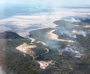 Queensland Parks and Wildlife Service said the fire was burning on two fronts. Credit - Holly Robertson