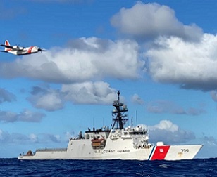 The crews of the Coast Guard Cutter Kimball (WMSL 756) and an Air Station Barbers Point HC-130 Hercules airplane conduct joint operations in the Pacific August 14, 2020. The crews were participating in the multi-country maritime Operation Nasse designed to prevent Illegal, unregulated or unreported (IUU) fishing in Oceania. Credit - U.S. Coast Guard