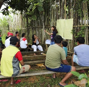 A community meeting in the Pangasananan territory to discuss restoration and farming plans. Courtesy of Virgilio Domogoy/Matricoso