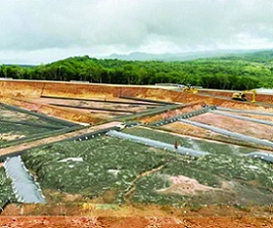 New national landfill and facilities in Aimeliik, built to last for 25 to 30 years. On top of the hill, a base to display four (4) WWII Japanese anti-aircraft artillery recovered from site as part of historical preservation of the site. Credit - Adam Somers