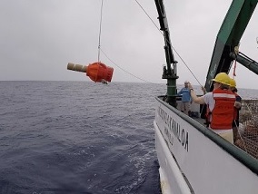 Elizabeth Steffen, a scientist at NOAA’s Pacific Marine Environmental Lab and the University of Hawaii, deploys a Deep Argo float off Hawaii in 2018. The float was tested in preparation for its use in a data-tracking array in the western South Atlantic. NOAA and Vulcan Inc. have been collaborating in the project. (University of Hawaii Photo / Blake Watkins)