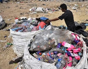 Recyclable plastic is gathered at the Ban Tarn landfill site in the northern Thai province of Chiang Mai. Photograph: Lillian Suwanrumpha/AFP/Getty