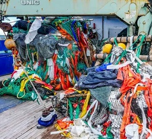 Two large fish-aggregating devices sit on the deck of a tuna purse-seine fishing vessel. Among the components are used salt bags, which are made of plastic. Photo: Francisco Blaha.