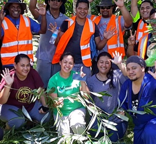 The team involved in the Rattan Raid holding the Rattan palms that were found at Papaseea. Credit - Samoa Conservation Society