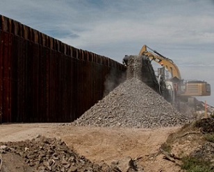 Creating cement for the border wall’s base creates dust and uses up an enormous amount of water from impoverished desert aquifers, up to 710,000 gallons of water per mile of wall by some measures. PHOTOGRAPH BY ADRIANA ZEHBRAUSKAS, THE NEW YORK TIMES/REDUX