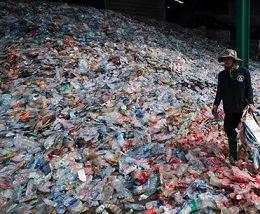 A mound of plastic bottles at a recycling plant near Bangkok in Thailand. Around 300 million tonnes of plastic is made every year and most of it is not recycled. Photograph: Diego Azubel/EPA