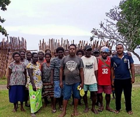 ECD Officer Fredrick Dotho with some of the Community Elders during the meeting in Leona Village, North Vella Lavella. Photo: Ravin Dhari. 