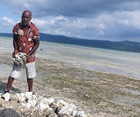 Chief Maserei with clam shell. Credit - Hilaire Bule, www.dailypost.vu