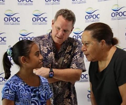 Ten- year- old poet Kau’ata Sagaitu sharing her thoughts with Pacific Ocean Commissioner Dame Meg Taylor and World Bank Resident Representative Lasse Melgaard during the launch of the ocean reports in Suva, Fiji
