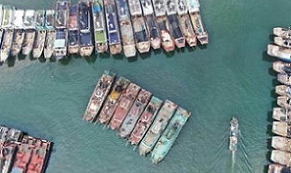 Aerial photo taken on May 13, 2020 shows fishing boats berthing at a harbor of the Hailing Island in Yangjiang, south China's Guangdong Province. (Xinhua/Deng Hua)
