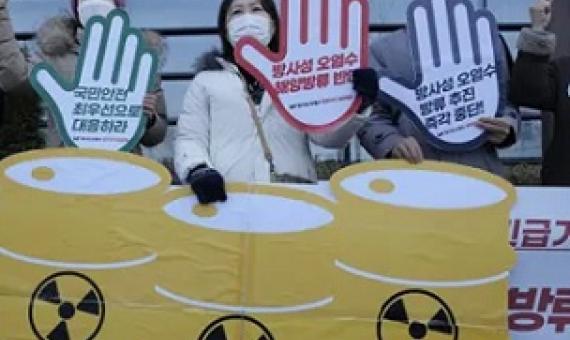 Environmental activists protesting against the decision to release the water. The plans have faced strong opposition. Photograph: Ahn Young-joon/AP