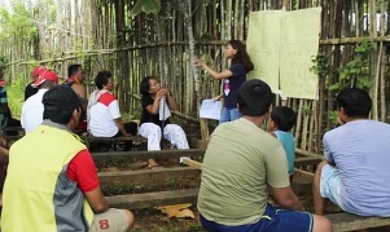 A community meeting in the Pangasananan territory to discuss restoration and farming plans. Courtesy of Virgilio Domogoy/Matricoso