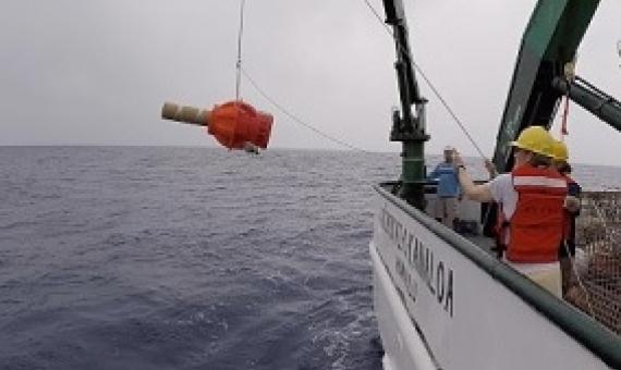 Elizabeth Steffen, a scientist at NOAA’s Pacific Marine Environmental Lab and the University of Hawaii, deploys a Deep Argo float off Hawaii in 2018. The float was tested in preparation for its use in a data-tracking array in the western South Atlantic. NOAA and Vulcan Inc. have been collaborating in the project. (University of Hawaii Photo / Blake Watkins)