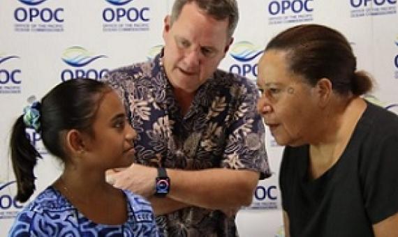 Ten- year- old poet Kau’ata Sagaitu sharing her thoughts with Pacific Ocean Commissioner Dame Meg Taylor and World Bank Resident Representative Lasse Melgaard during the launch of the ocean reports in Suva, Fiji