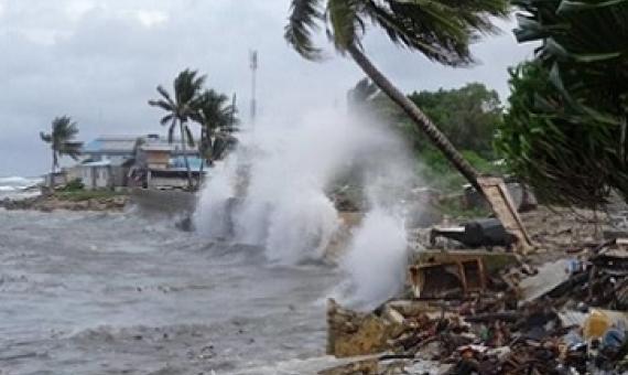 Waves crash into the Uliga back road sea wall in the Marshall Islands, 27-11-19. Photo: RNZ Pacific / Hilary Hosia