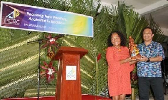 In 2020, Ann Singeo receiving the 2nd Tommy E. Remengesau Jr. Environmental Award during PICRC’s 19th Anniversary-Dinner Gala, with Maderngebuked- Tommy E. Remengesau Jr. Credit - www.islandtimes.org